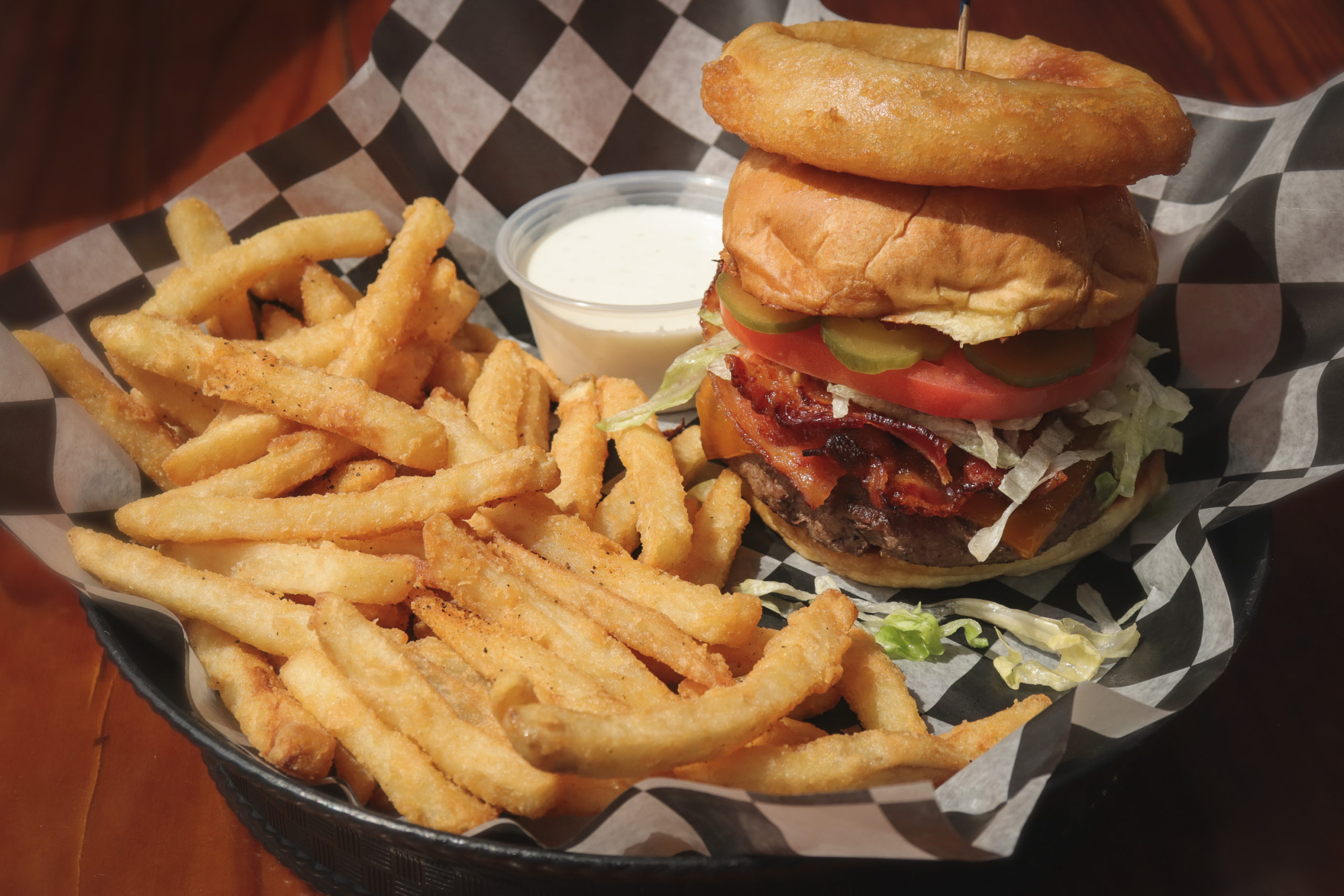 hamburger and fries in basket