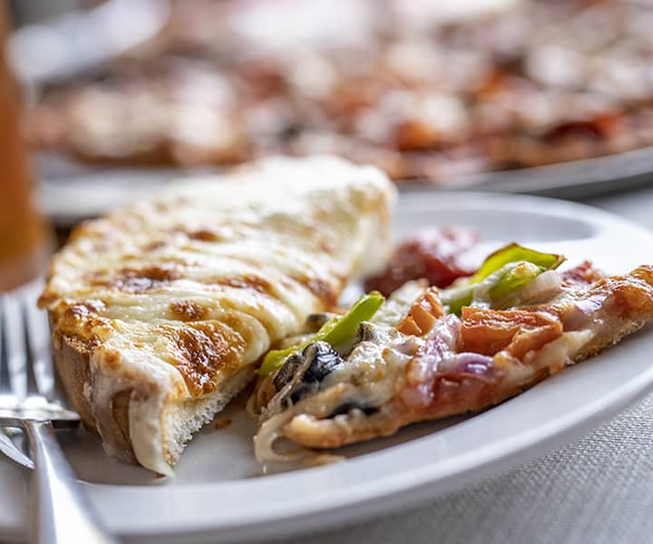 delicious plate of cheese bread and pizza